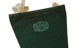 Reverse of vintage felt flag with light blue 'The Felt Crafters' factory stamp.
