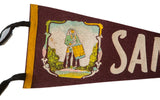 Santa Fe felt pennant's drummer illustration, yellow edge, and white 'SA' text.