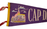 Purple vintage Cap-de-le-Madeleine felt pennant, yellow trim, red ties, church graphic.