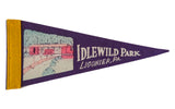 Vintage Idlewild Park Ligonier PA felt pennant, purple with yellow trim and park illustration.