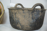 Mottled dark gray recycled rubber basket side with embossed herringbone pattern.