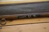 Vintage Cram's U.S. map dowel with black label and metal hanging ring.
