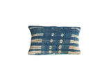 Vintage African Indigo Batik Pillow featuring sun-faded patterns and a mint green linen back.