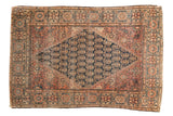 Antique Persian Farahan Sarouk rug, dark navy boteh diamond, dusty cochineal red field, mostly even wear, 3'3