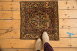 Scale view of a small vintage Josan Sarouk rug showing its overall pattern and abrash.