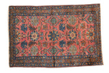 Vintage Lilihan Sarouk rug featuring a cranberry red field and soft cobalt blue floral pattern, 2'6