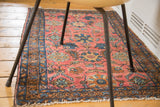 Hand knotted Lilihan Sarouk rug, cranberry red field, soft cobalt floral pattern.