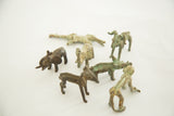 Vintage African bronze elephant miniature, showing its aged texture and rich patina.