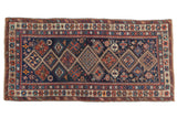 Hand-knotted antique Fine Caucasian rug with geometric medallions on dark indigo. 3'4