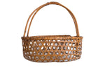 Vintage Japanese delicate hand-woven basket featuring an open hexagonal pattern and arched handles.