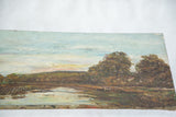 Angled view of an antique landscape painting, depicting textured trees, water, and soft sunset hues.