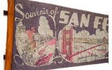 Vintage San Francisco felt flag with 'Souvenir' text and faded city illustrations.