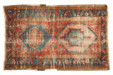 Distressed antique Bakshaish runner with geometric patterns, bursts of red, ocean blue, mint green.