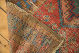 Distressed Bakshaish runner with mint green, ocean blue motifs and hand-knotted foundation.