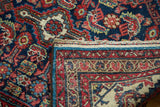 Vintage Tajabad rug corner revealing original blue selvage, Herati pattern, and woven foundation.