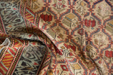 Finely woven lattice design and rare light blue border of a draped antique Caucasian Marsali rug.