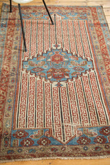 Rare antique Malayer rug, ruby red and aqua blue with channel shadow design.