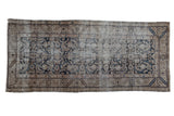 Distressed antique Hamadan runner showcasing an allover dark teal Herati pattern, 3' x 6'8