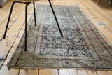 Antique Persian Hamadan runner, showing even distress on allover herati motif in teal and tan.
