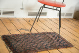 Unusual allover repeating boteh pattern, showcasing aged texture and dark tones.