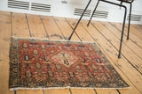 Antique pictorial Malayer rug mat, blush brick red, indigo blue, and animal motifs.