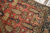 Antique Malayer rug's intricate pattern displays time-softened blush red, indigo, and warm brown.