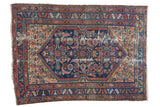 Distressed antique Malayer rug, cobalt blue abrash medallion, salmon, rust, yellow tones. 3'7