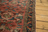 Antique Lilihan rug with whimsical burgundy field and fabulous navy border contrast.