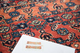 Rich cherry red pile, intricate azure blue and lavender motifs on vintage Persian Engelas rug.