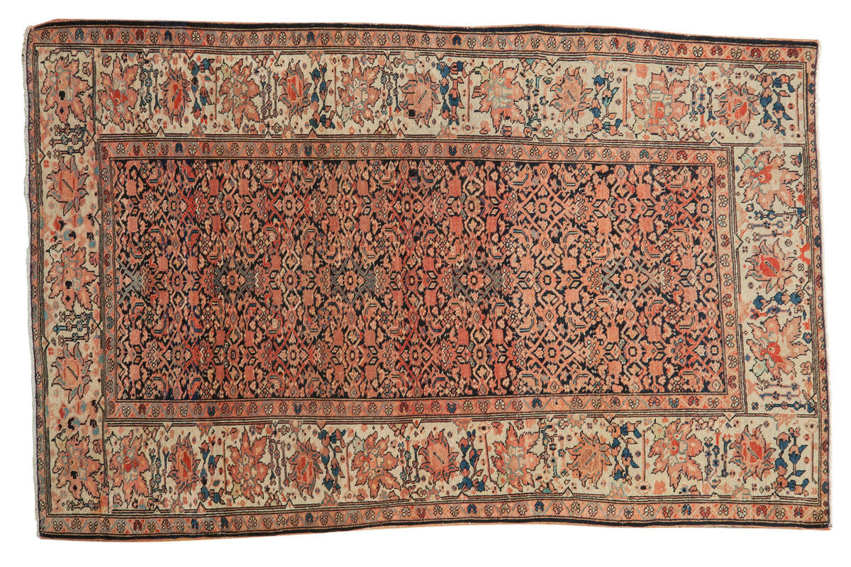 Antique Farahan Sarouk rug, fine weave, indigo herati field, ivory border with lotus flowers.