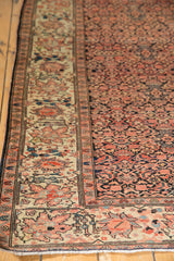 Antique Farahan Sarouk rug border detail: finely woven serrated leaves, lotus flowers, and fringe.