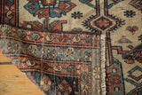 Hand-knotted reverse, fringed edge, and rustic tones of an antique Hamadan runner.