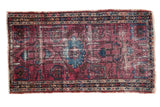 Distressed vintage Lilihan rug, vibrant fuchsia and azure blue stylized floral motifs, 2'6