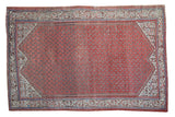 Distressed Antique Mir Serbend rug, faded terra cotta field, allover boteh, arctic blue abrashes.