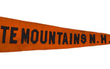 Antique orange felt banner with hand-sewn black letters 