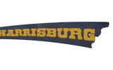 Yellow 'HARRISBURG' text on dark blue antique felt banner remnant, frayed edge.