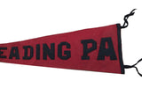 Close-up of antique red wool felt pennant, hand-sewn black 