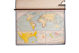 1967 Denoyer Geppert vintage world map detailing early exploration routes with walnut rod.