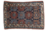 Vintage hand-knotted Persian Lilihan rug with distressed copper red and navy blue geometric patterns.