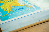 Vintage USA pull down map corner, Alaska section, blue border with spots, wooden dowel.