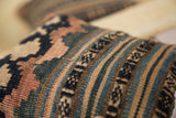 Finely woven texture of the circa 1915 kilim pillow fragment with a beautiful faded palette.