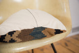 Seam of Antique Kilim pillow with organic cotton back and faded brown, blue geometric fragment.
