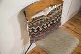 Antique Kilim throw pillow with geometric pattern and lovely faded colors.