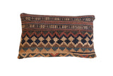 Antique Kilim Throw Pillow, early 20th century, featuring faded geometric patterns in navy and earthy tones.