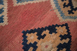 Close-up detail of antique circa 1915 Kilim fragment's geometric weave and loveliest fade.