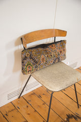 Reclaimed purple Bibikabad rug fragment pillow displaying detailed pattern and black linen back.