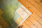 Vintage Australia pull-down map, detail of the title block and natural wood dowel.