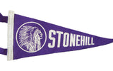 Detail of purple felt Stonehill banner with white stitched edge and American Indian graphic.