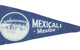 Vintage blue felt banner showing Mexicali Mexico text and US border graphic.