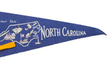 White 'North Carolina' text on the vintage royal blue felt pennant banner tip.
